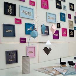 Imán de letras de madera con marco de corazón