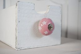 Pink furniture knob with star design, 4 cm in size, from the Isabelle Rose collection, suitable for drawers.