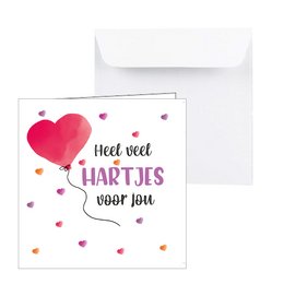 A greeting card with a large red heart and the text "Heel veel hartjes voor jou" (Lots of hearts for you) in Dutch. The card is decorated with colorful heart-shaped confetti.