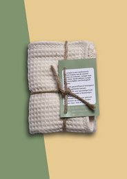 Soft, organic face cloth made of natural fibers. Ideal for gentle cleansing and exfoliation. Comes with a twine tie for easy hanging.