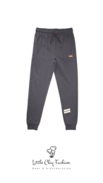 Gray boys jogger pants with elastic waistband and cuffs. Comfortable and casual style for everyday wear.