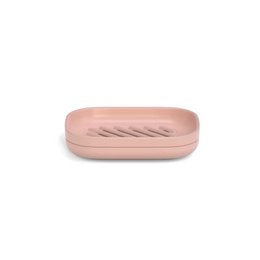 Blush-colored self-draining soap dish with a ribbed texture for efficient drainage.