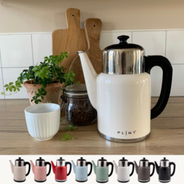 A sleek and modern electric kettle in a variety of colors including cream, rose, red, ice, leaf, white, almost black, and black. The kettle features a stainless steel body and a simple, minimalist design.