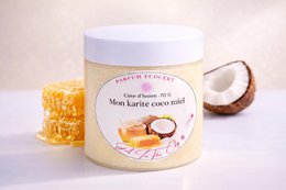  Creamy coconut honey body butter, natural shea, moisturizing cream jar, golden beige texture.