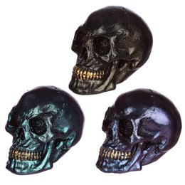 Small iridescent skull statue with a dark, glossy finish and a hint of turquoise coloring.