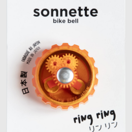  Colorful, musical doorbell with various shapes and textures. Includes orange, black, transparent, blue, and raspberry pink variants.