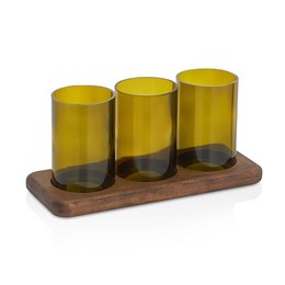 Three amber-colored glass vases on a wooden plateau, displaying various decorative elements such as greenery and wheat stalks.