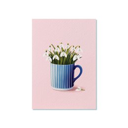 Vibrant tulip bouquet in a turquoise vase on a postcard.