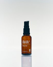 Delay Gel, a supplement product in a glass bottle with a black spray top. The bottle has a light brown color and the label displays the brand name "ala".