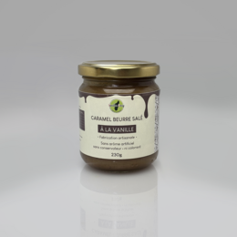  Caramel Beurre-Salé à la vanille, a sweet and salty toffee with a vanilla flavor. The product has a rich, golden-brown color and a smooth, creamy texture.