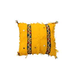 Small traditional Moroccan cushion covers in a variety of vibrant colors including yellow, red, blue, purple, pink, and green. Features decorative patterns and tassels.