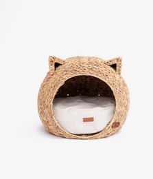 Woven cat-shaped pet basket with cozy interior for cats and small pets.