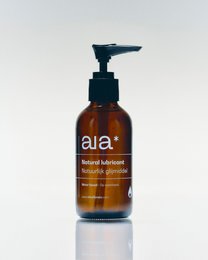 Natural lubricant in amber glass bottle with pump dispenser