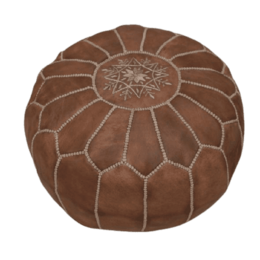Chocolate brown Moroccan-style pouf with intricate stitching and a decorative center design. Made of durable leather-like material, suitable for use as a cushion or footrest.