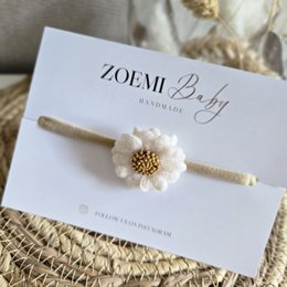  Ecru crochet flower headband for kids, soft and comfortable material, delicate floral design.