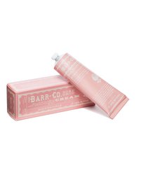 Honeysuckle-scented hand cream in a pink tube. Moisturizing formula with natural ingredients.
