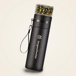 A black, cylindrical smart bottle with a tea strainer inside. The bottle has a strap for easy carrying and appears to be made of a durable, water-resistant material.