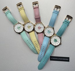 Colorful, pastel-toned watches with leather straps and round faces. Suitable for casual or formal wear.