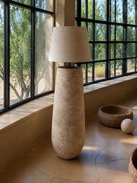  "Tall cylindrical ceramic floor lamp, natural beige stone texture, modern minimalist design, round base"