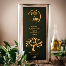 Premium extra virgin olive oil in a green and gold tin container with the Telia brand logo featuring a tree design.