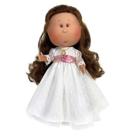 A white communion dress with a pink flower headpiece, a doll with long brown hair and a smiling face.
