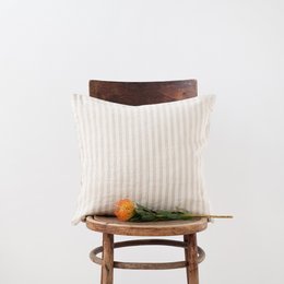 Natural white striped linen cushion cover in various sizes and colors including beige and white. Suitable for living room, bedroom, or outdoor use.