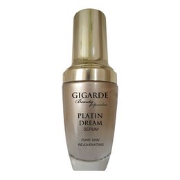 Platinum Dream Serum 30 ml, a luxurious face serum in a sleek gold and black packaging, containing nourishing ingredients for radiant skin.