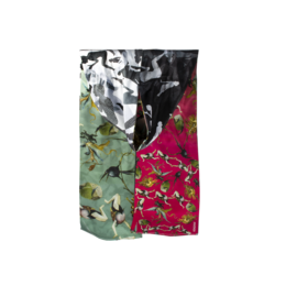 Silk scarf with a colorful floral pattern featuring red, green, and black elements. The scarf has a rectangular shape and appears to be made of high-quality silk material.