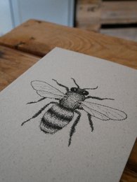 Grass paper notebook bee