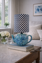 Hand glazed pistachio green ceramic teapot lamp with conical rattan shade, suitable for table lamps.