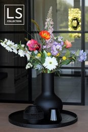 Round, black wooden tray suitable for candles, serving, or home decor. Measures 60cm in diameter.