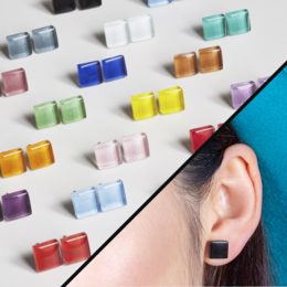 Square ear studs with glass stones in a variety of colors including yellow, white, blue, pink, brown, green, purple, and more. Minimalist and durable design.