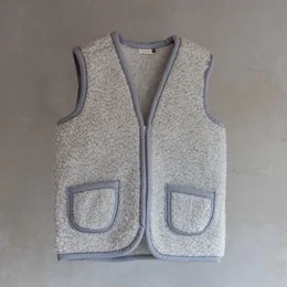 Cozy gray fleece vest with two front pockets, suitable for casual wear in cool weather.
