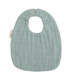 A soft, mint-colored bib with a textured, ribbed design. Made of high-quality materials for comfort and durability.