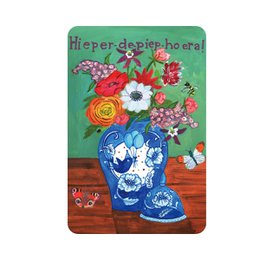 Colorful floral arrangement in a blue vase on a wooden surface, with text "You are wild and loved" visible.