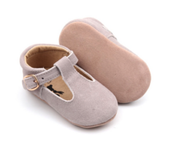 Gray suede baby shoes with flexible soles and a T-strap design. Available in sizes 17-22.