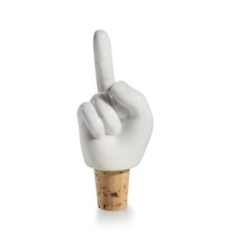 A white ceramic hand-shaped bottle stopper with a cork base. The product is designed with a rude hand gesture, making it a humorous and unique wine accessory.