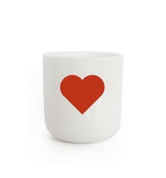 A white ceramic mug with a large red heart graphic printed on the front. The mug has a simple, minimalist design that would be suitable for everyday use or as a gift.