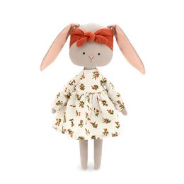Soft plush toy frog with a pink dress and crown. Ideal for children's play and decoration.