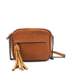 Tan leather shoulder bag with tassel detail and adjustable strap.