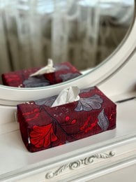 Rectangular red tissue box cover with abstract floral pattern.