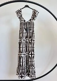 "Sleeveless maxi dress with geometric vertical stripe pattern, available in dark brown, orange, red, and brown"