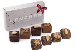 Box of 8 gingerbread chocolate mix. Assorted chocolate truffles in a gift box, featuring flavors like gingerbread.
