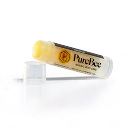 Coconut-flavored lip balm in a yellow tube with the PureBee logo.
