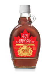 Amber-colored, delicate-flavored Canadian maple syrup in a 250g glass bottle.