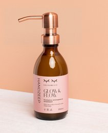 Natural hand soap in 250 ML, 500 ML, and 1000 ML sizes with a recommended retail price of €14.95, €24.95, and €39.95 respectively. The soap features a glow and flow formula and is part of the hand soap category.