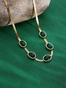 Vergulde statement ketting – groene edelsteeninleg