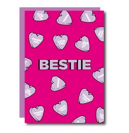 Greeting card with a pink background and white heart shapes, featuring the text "BESTIE" in the center.
