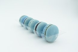 Light blue macarons with a smooth, round shape and a delicate texture.
