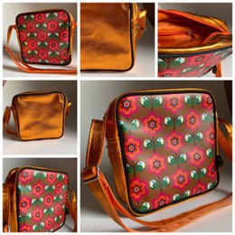  Shoulder bag with retro circles in orange color, made of durable material, featuring a stylish and compact design suitable for cross-body wear.